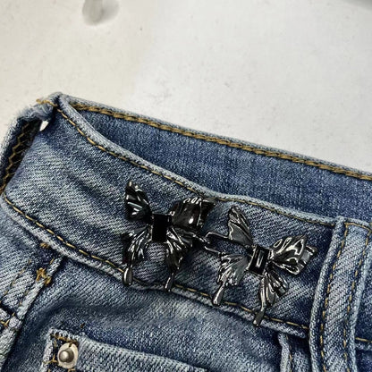 Bow waist adjuster buckle