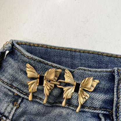 Bow waist adjuster buckle